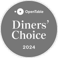 This image shows a circular badge that reads "OpenTable Diners' Choice 2024" on a gray background.