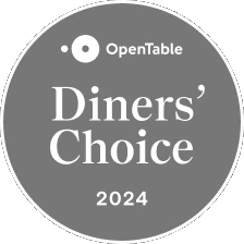This image shows a circular badge that reads "OpenTable Diners' Choice 2024" on a gray background. logo on footer section.